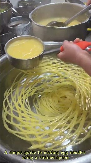 A simple guide to making egg noodles using a strainer spoon