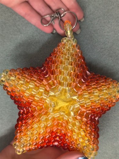 here's a puffy star keychain made with Kandi beads! this has been in my lineup for a little while :p . . . #beads #crafting #crafts #beading #kandi