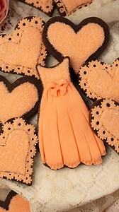 490K views · 1.5K reactions | I used modeling chocolate and royal icing to decorate these pretty peach dress cookies. Modeling chocolate is similar to fondant but tastes a lot better, in my opinion! The instructions and recipes are in the Cookie Art Club! | SweetAmbs | Facebook