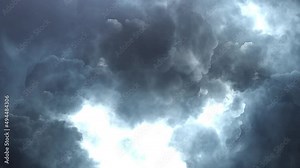 thunderstorm, lightning among dark blue clouds moving in the sky.