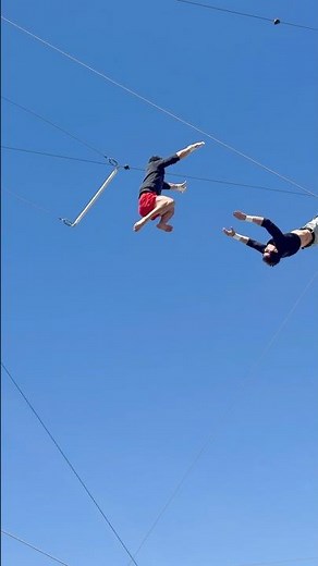 Can a world class flying trapeze artist do a basic beginner trick?