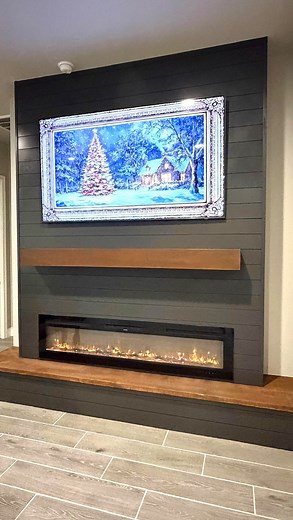690 reactions · 52 shares | Just completed this media wall for our Bulverde clients — warm wood accents, dark shiplap, and a cozy electric fireplace glow. The room feels complete now.  #mediawall #mediawallideas #accentwall ##accentwallideas #livingroomdesign #interiordesign #walldecor #walldesign #designideas #inspo #savvyfarmhousedesignco #texasmakers #customwoodwork | Savvy Farmhouse Design Co. | Facebook