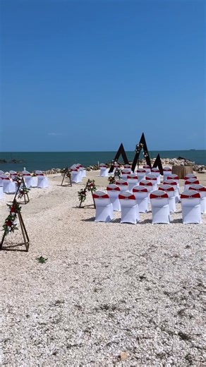 Love, laughter, and breathtaking coastal views – our beachside weddings are nothing short of magical! Say 'I do' amidst sun-kissed sands and ocean waves, creating memories that will last a lifetime. Ready to create your own fairytale? Email us to book your dream event at any of our spaces and gain complimentary access to a seaside ceremony. Event decor by David Matus. | Old Belize