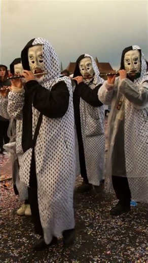 The traditional carnival parade of carnival masks in Basel, Switzerland.