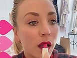 Kaley Cuoco puts pink lipstick on as she prepares for the 2021 SAG Awards