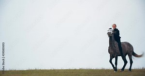 Wild West, woman is riding a horse, doing a trick, rearing up on a horse, 4k