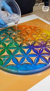 Oak and resin clock inspired by the flower of life