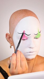 Clown makeup tutorial for the clown transition video I made a couple days ago!! • •Paints by @mehronmakeup •Neon green is a individual color •The pink came from my Mehron palette •And the white is called “white clown” •For the lashes I used @lillylashes individually lashes for bottom eye effect •And for the strip lashes I used @ardellbeauty a dramatic pair but then separated the lashes with lash glue! | Emmy