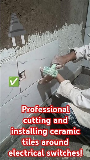 Professional cutting and installation of ceramic tiles around electrical switches!