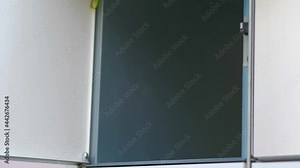 Taking out a parcel from a parcel locker in 4k slow motion 60fps