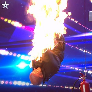 24M views · 1.3K shares | Jonathan Goodwin SET HIMSELF ON FIRE in an unthinkable escape act! Watch him attempt to get out of straitjacket... while hanging upside down... while set alight  #BGT | FremantleHQ | Facebook