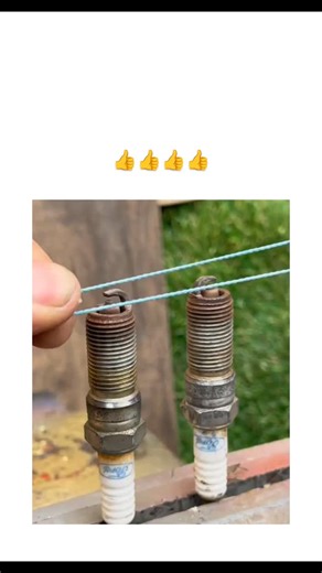 GLOBAL REEL HUB on Instagram: "#The video demonstrates a low-tech hack where green string is looped around the hex nuts of two rusty spark plugs in an engine cylinder head, then pulled taut with pliers to extract them simultaneously, avoiding socket slippage in tight or seized conditions. This technique relies on the string's grip to apply even pulling force without thread damage, a variation of mechanic tips like rubber hoses for plug retrieval, though unverified in peer-reviewed sources and be
