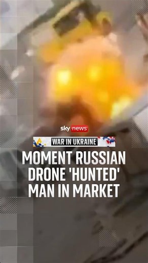 Moment Russian drone 'hunted' man in market