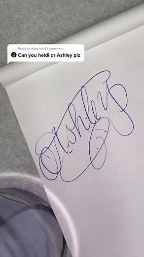 Creating Freestyle Calligraphy: Writing 'Ashley' in Cursive Script