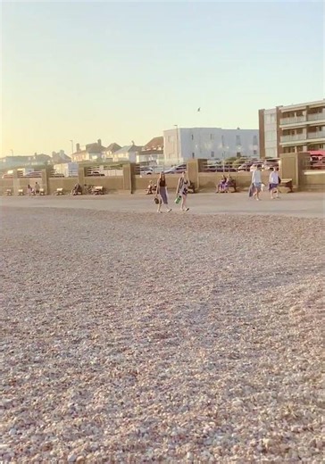 Hazy heatwave evening beach Seaford beach Sussex, beach near London, free summer days out