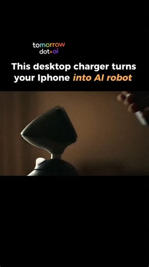 tomorrow dot ai on Instagram: "CES 2026 just showed the future of desk assistants 🤖📱 The Loona DeskMate is a desktop charger that turns your iPhone into a robotic AI assistant. Drop your phone in, and it becomes the “brain” — while the base gives it movement, personality, and physical presence. Instead of talking to a screen, you’re now interacting with something that can look at you, react, and move. It’s a small shift… but it completely changes how AI feels. This is where personal assistants