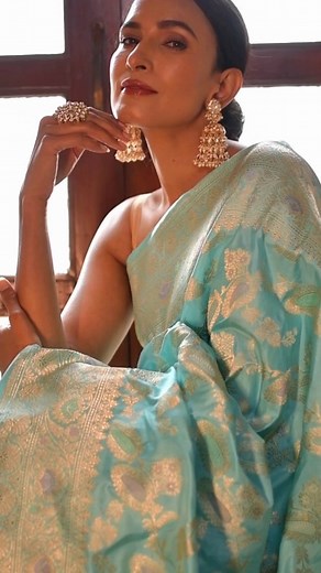 Introducing Aqua Blue Katan Silk Handloom Banarasi Saree from Sacred Weaves, crafted with the finest KADHUA technique, this saree features with pastel Meenakari floral jaal, a blend of resham and zari, making it a classic and timeless addition to your trousseau #sacredweaves #banarasisilksarees #banarasisaree #katansilksaree #katansilk #handloombanarasisaree #vintagebanaras #vintagesarees #iwearhandloom | Sacred Weaves