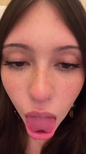 Girl Sticking Out Her Sexy Tongue