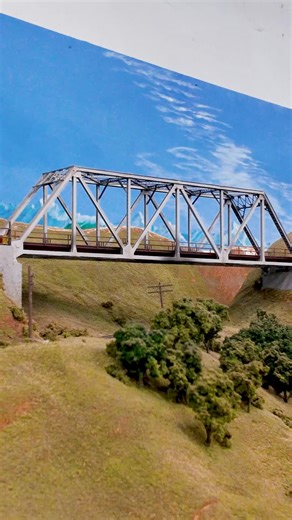 Golden State Model Railroad Museum | An Altamont Over/Under as the Southern Pacific Cascade and a Rainbow-Era Amtrak train (serving as a car move for staging) crisscross each... | Instagram