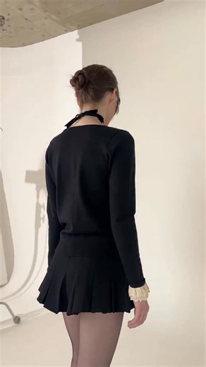 Introducing The French Maid Cardigan. For those French maid detail lovers - this cardigan has cream Cotton Eyelet cuffs and Neckline- worn with the Pleated Skort. Model: @norafawn | L'école des Femmes