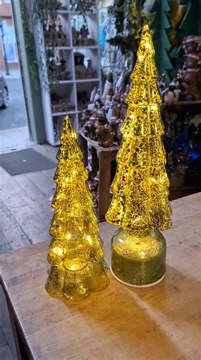 2.7K views · 39 reactions | How beautiful  Glass light up(battery operated) xmas trees Small £13.00 Large spinning £20.00 | Bloomers Florists | Facebook