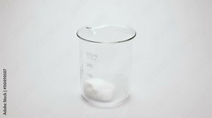 Pouring red liquid in glass with dry ice. Steaming red liquid.