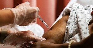 Covid vaccines will likely become annual like flu shots, health officials say