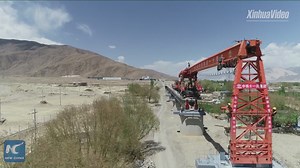 19K views · 731 reactions | Workers are laying tracks on the 435-km Lhasa-Nyingchi Railway, the first electrified railway in Tibet. | China Xinhua News | Facebook