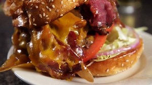 44K views · 800 reactions | Stuffed quahogs, juicy steak tips, and bacon tater tots. Deliciously different eats at this "five-star dive bar". | Phantom Gourmet | Facebook