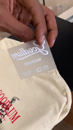 You ever see those spots on your dtf transfers or have a glossy finish over your blacks? Here is a quick tip how to get rid of them! After you press your dtf onto the garment, use a brown craft paper or repurpose a paperbag (without ink or glue) and press directly onto the garment for a full press cycle. This will matte the black and absorb the oily spots leaving a clean finished product! Like the shirt? Its a new color thats coming to our website soon! Other colors available now! #goodlum #fyp 