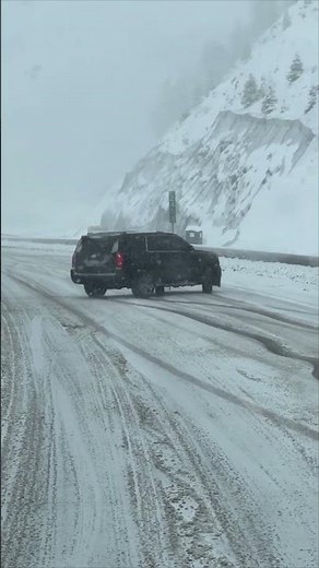 Heavy Snow Makes Car Slide Out of Control