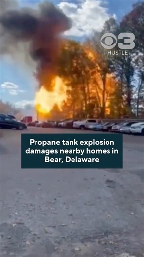 CBS Philadelphia on Instagram: "A propane tank explosion along the Delmarva Central Railroad tracks in Bear, Delaware, damaged several buildings and homes Saturday afternoon, officials said. Video obtained by CBS News Philadelphia shows thick black smoke before a large explosion sends bystanders running for cover. Click the link in our bio for more. CREDIT: Rigoberto Sanchez"