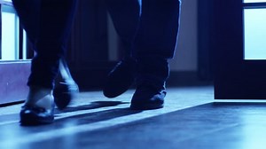 clip-22343053-door-opens-than-man-woman-entering-dark