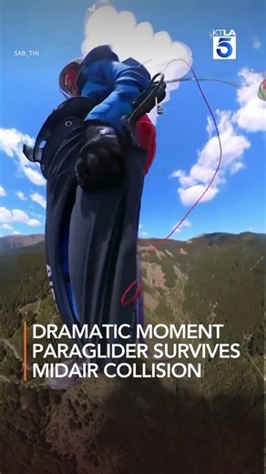 Dramatic moment paraglider survives midair collision