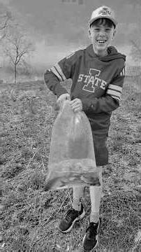 Father-son fun. Pond fishing stocking.