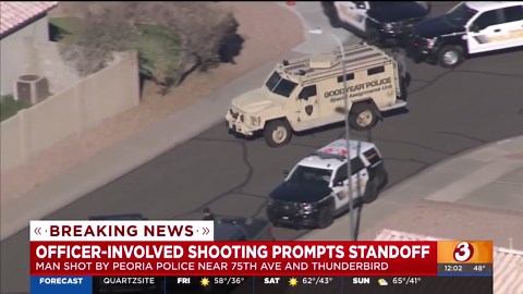 Standoff ends after man shot by Peoria police taken into custody