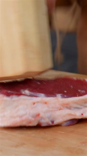 50K views · 723 reactions | Tender meat steaks roasted inside a foil-wrapped log over an open fire, drizzled with sauce for extra flavor. Experience the magic of outdoor cooking! #OutdoorCooking #CampfireCooking #MeatSteaks #Cooking | Wilderness Grill | Facebook