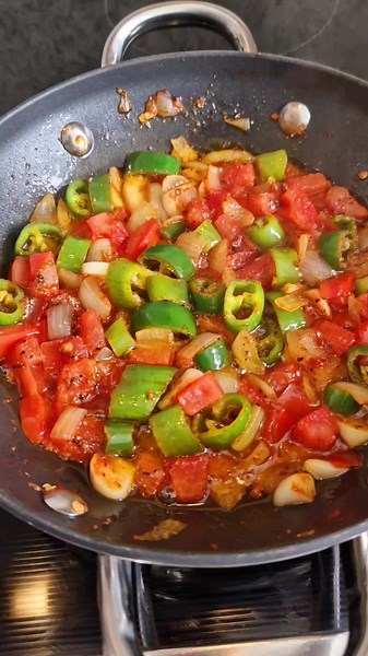 Sautéing Colorful Vegetables in a Frying Pan