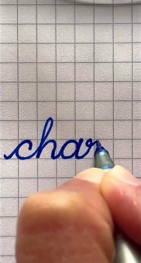 Beautiful Cursive writing - word “charm“