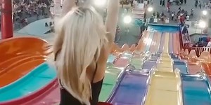 You can race down this enormous rainbow slide