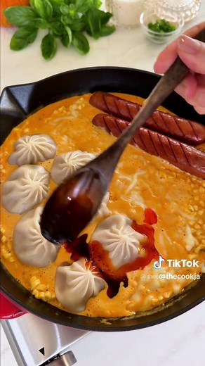 Would you try soup dumplings on Samyang Carbonara Buldak? 🥟🔥 Creamy, cheesy ramen topped with juicy xiaolongbao and pan-fried sausages. 📌 Save this one-pan ramen idea for later. ✨ Cheesy Soup Dumpling Buldak Ramen 📝 Ingredients • 1 pack Samyang Carbonara Buldak Ramen • 2 slices cheddar cheese • 1 slice Havarti cheese • Mayonnaise • Buldak liquid sauce packet • Carbonara Buldak powder packet • ½ cup heavy cream • 1 cup water • Shredded mozzarella cheese • Soup dumplings (xiaolongbao) • 2 hot