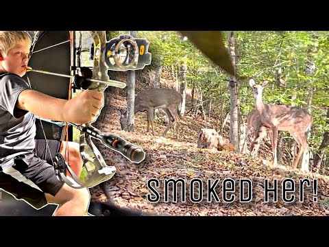 Kid SMOKES a doe with his compound bow!
