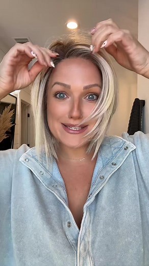 This short babe of a wig Seoul in Milkshake Blonde from Belle Tress is...