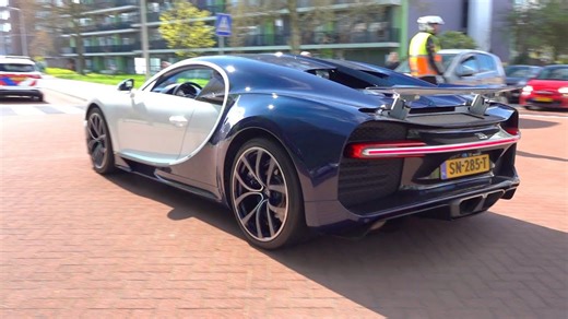 Bugatti Chiron and Supercars Passing Through the City