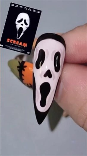 Channel your inner Ghostface with these Scream-inspired nails!!!