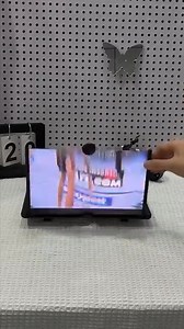 5.1K views · 11 reactions | Turn your phone into a mini home theatre!  Enjoy your favorite movies, shows, and games on a bigger, clearer HD screen — no eye strain, no extra gadgets. ✨ Foldable, portable & compatible with all phones! Perfect for travel, work breaks, or cozy nights in.  Experience big-screen vibes anytime, anywhere. | Dropmint | Facebook