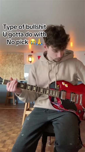 Taping a Guitar Pick to My Forehead: A New Approach