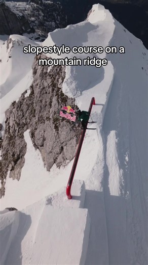 Slopestyle Skiing Adventure on a Mountain Ridge