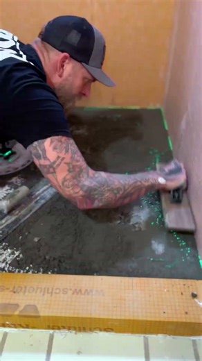 Building a mud pan in a sealed shower system.