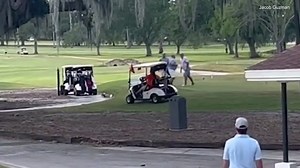 Moment a brawl between rival golfers erupts on Florida course